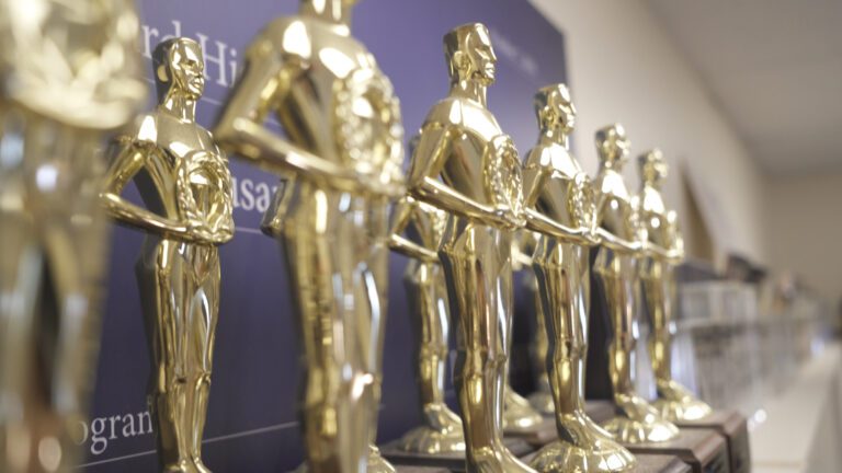 a row of student filmmaking trophy awards at Ballard High School