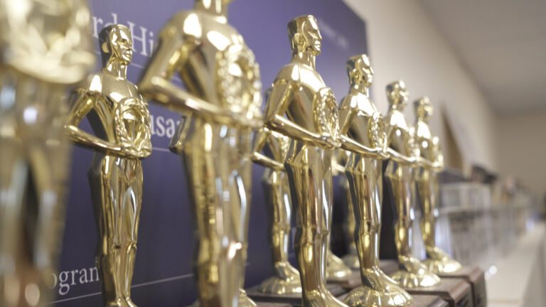 a row of student filmmaking trophy awards at Ballard High School